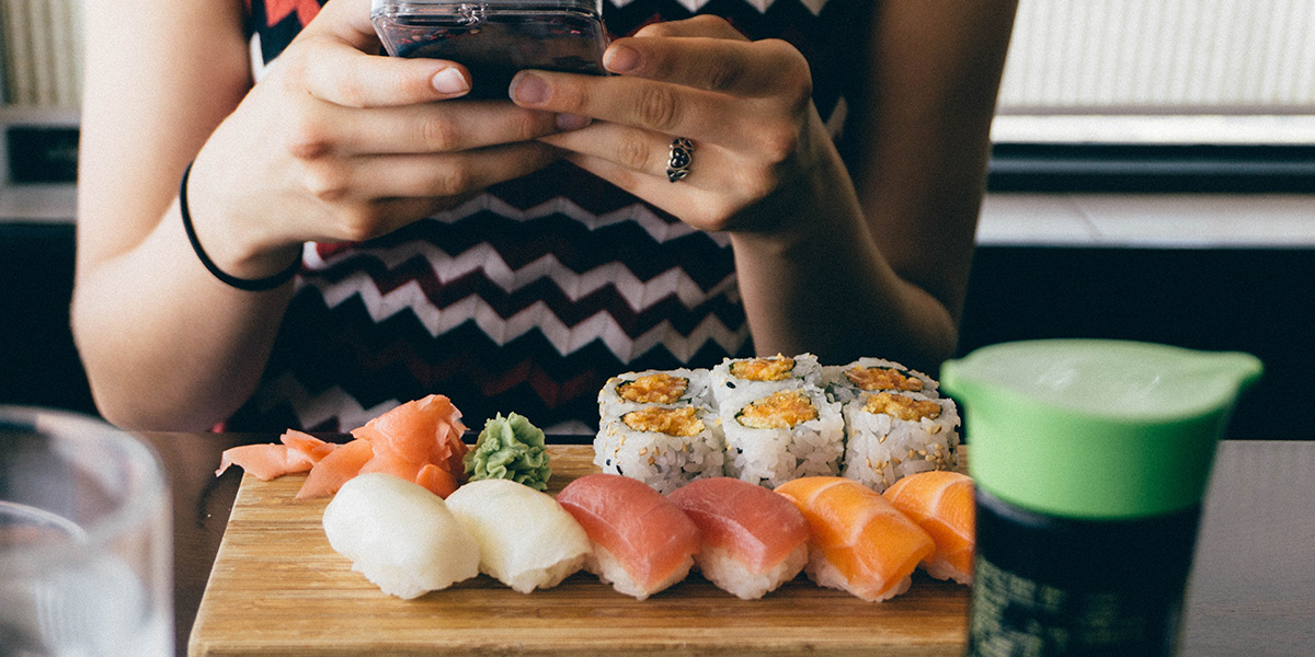 Sushi dinner in front of woman