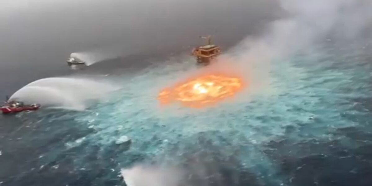 gas leak causing a fire in the Gulf of Mexico, ships putting out the fire with nitrogen
