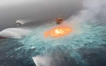 gas leak causing a fire in the Gulf of Mexico, ships putting out the fire with nitrogen