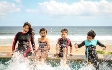 Marine Educator: Kids with educator in the water