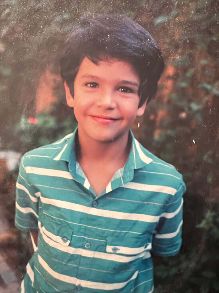 Fernando as a young child, smiling