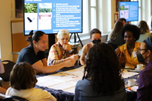 Educators Summit attendees participating in a hands on activity led by Krysta Hougen-Ryall