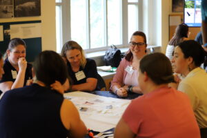 Educators Summit attendees participating in a hands on activity led by Krysta Hougen-Ryall