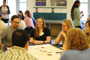 Educators Summit attendees participating in a hands on activity led by Krysta Hougen-Ryall