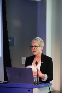 Carrie McDougall speaks at the Educators Summit ahead of the Science on a Sphere activity