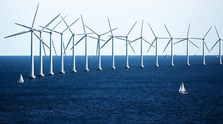 A photo of windmills and sailboats (http://www.cgpgrey.com, CC BY 2.0 <https://creativecommons.org/licenses/by/2.0>, via Wikimedia Commons