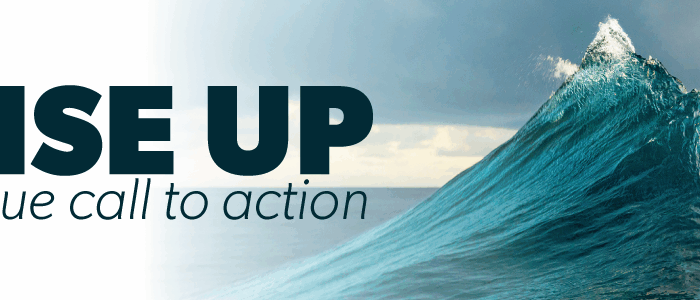 Picture of a wave with Rise Up in black lettering.